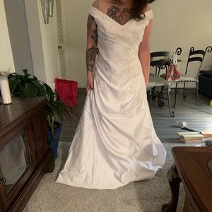 Worn once and has been in my closet since. New condition